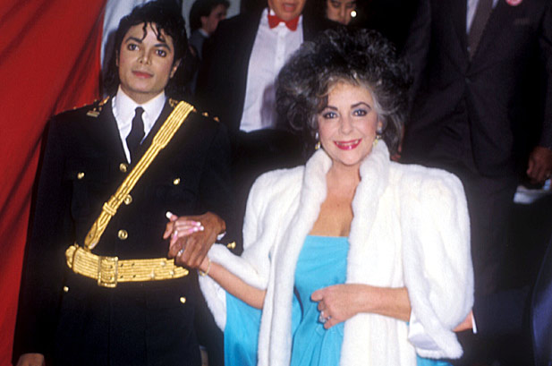 1046469-elizabeth-taylor-michael-jackson-american-music-awards-1986-617-409